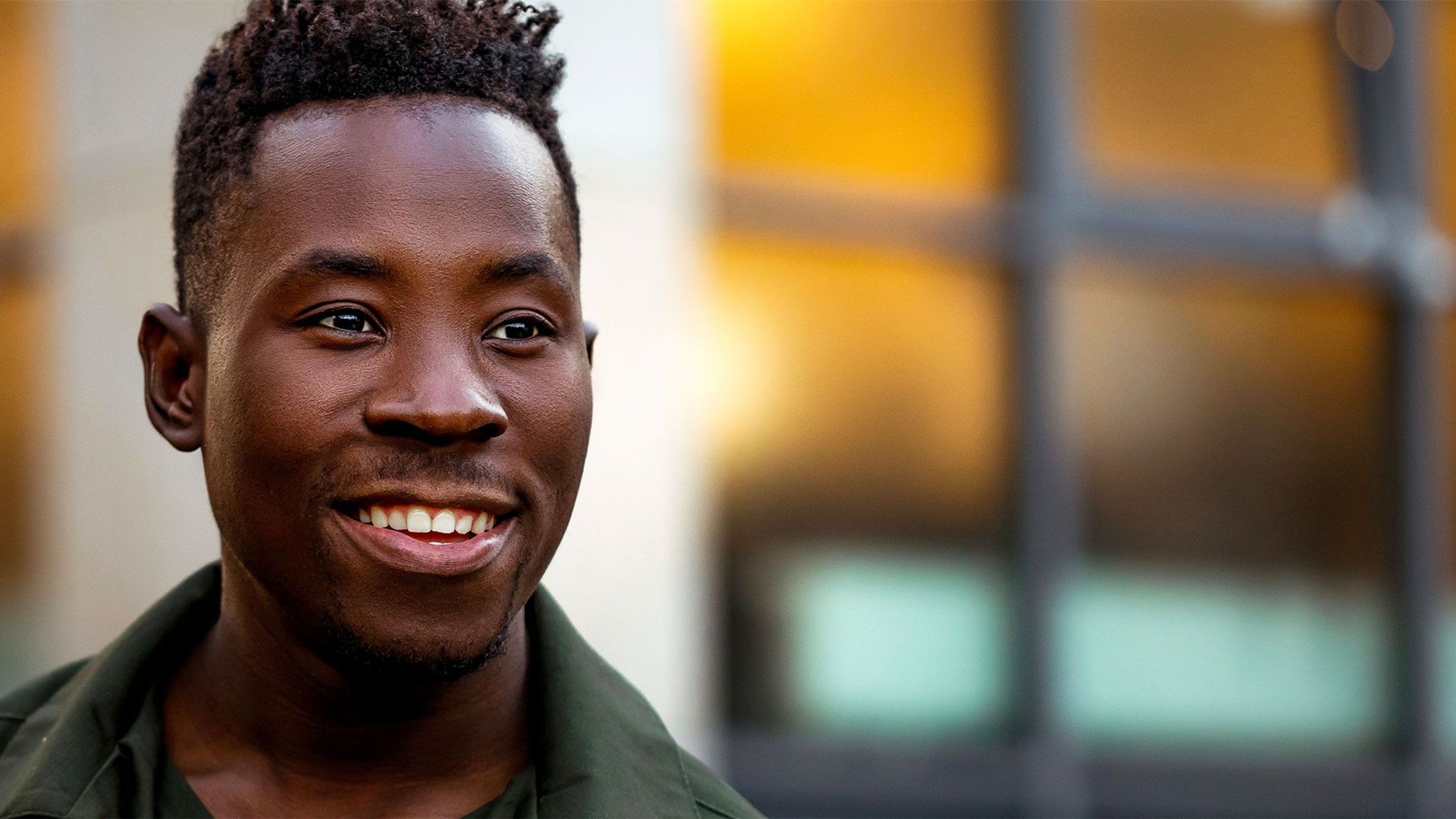 An image of a man smiling